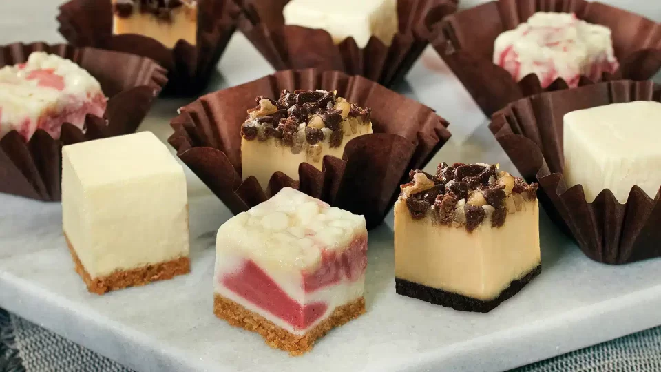 Close-up of Dessert Holdings cheesecake squares, delivered cross-border to Canada by Trappers Transport's temperature-controlled reefer trucks.