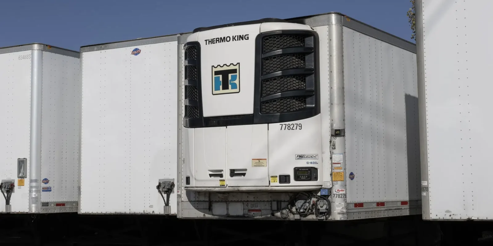 refrigerated-transport-express-truck-parked A refrigerated transport truck parked ready for express deliveries.